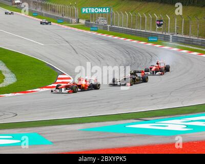 SEPANG, MALESIA - 10 aprile: auto sulla pista di gara del GP di Formula 1, 10 aprile 2011, Sepang, Malesia Foto Stock