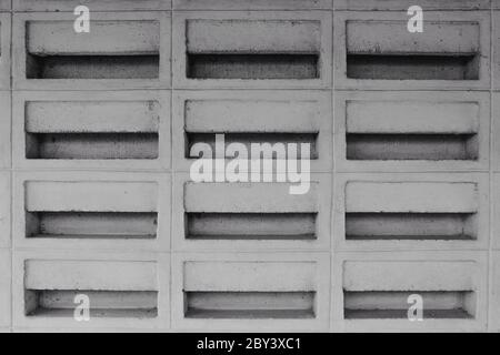 Piazza blog di architettura geometrica. Parete moderna. Dettagli della struttura dell'edificio. Nero e bianco di sfondo astratto. Foto Stock