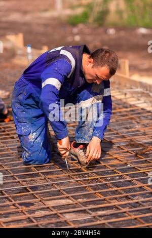 Barre di rinforzo per piastra base per fondazione casa per base casa nuova. Foto Stock