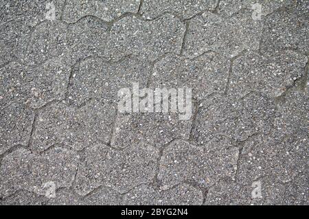 Una texture di un closeup di ciottoli grigio. Foto Stock