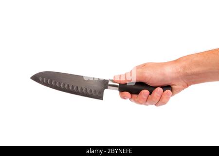 La mano è in possesso di una cucina kinfe isolato Foto Stock