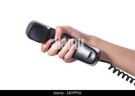 Mano che tiene un vecchio nero tubo di telefono Foto Stock