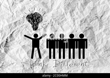 Icone di persone think different idea design su carta sgualcita Foto Stock