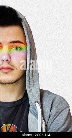 Ragazzo con un arcobaleno in faccia. Foto Stock