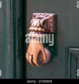 Vintage a forma di mano porta respingente Foto Stock