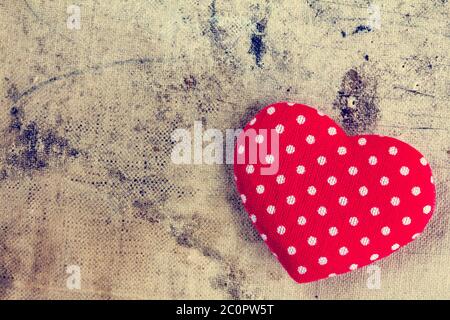 Cuore rosso di polka dot fabric Foto Stock