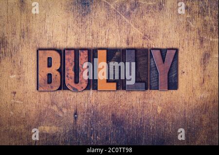 Tipo di pressa per lettere in legno Bully Concept Foto Stock