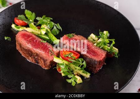 Ottima cucina con carne di cervo e verdure Foto Stock