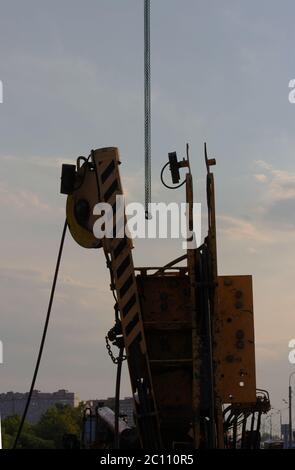 Gancio e il sollevamento del braccio della costruzione di macchinari Foto Stock