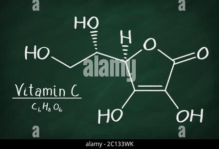 Formula chimica della vitamina C su una lavagna Foto Stock