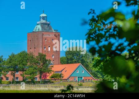 Il più antico faro della Germania, costruito nel 1380, isola del Mare del Nord di Neuwerk, Stato federale di Amburgo, Germania del Nord, Patrimonio Mondiale dell'UNESCO Foto Stock