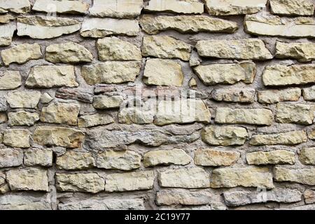 texture beige parete di pietre storiche tufo calcareo. GATCHINA, Russia Foto Stock