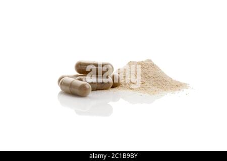 Cumulo di gotu kola polvere con capsule di gel. Foto Stock