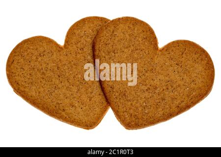 Due biscotti di pan di zenzero a forma di cuore Foto Stock