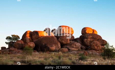 Devil's marmi in Australia settentrionale di sunrise Foto Stock