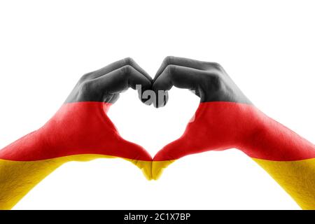 Due mani in forma di cuore con la bandiera tedesca isolati su sfondo bianco Foto Stock