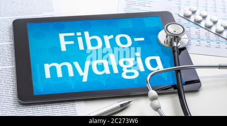 La parola fibromialgia sul display di un tablet Foto Stock