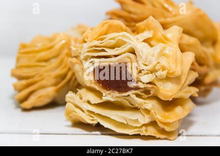Dolci fritti con i dolci di mela cotogna e batata tipici della gastronomia Argentina Foto Stock