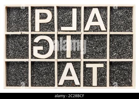 Parola PLAGIAT insolito ortografia su sabbia nera Foto Stock