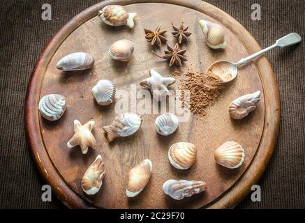 Caramelle di cioccolato di lusso sotto forma di frutti di mare Foto Stock