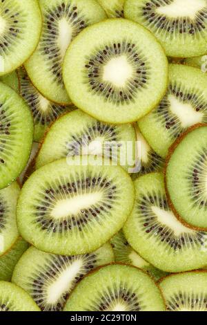 Kiwi raccolta sfondo alimentare formato ritratto fette di kiwi freschi sfondi di frutta Foto Stock