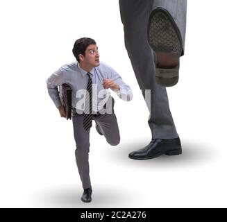 Bad arrabbiato boss calci dipendente nel concetto di business Foto Stock