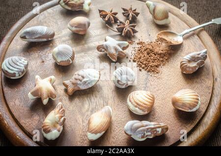 Caramelle di cioccolato di lusso sotto forma di frutti di mare Foto Stock