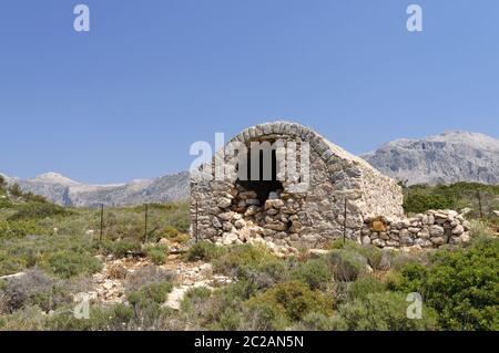 Inizio necropoli cristiana cappelle funerarie, Telendos Island, Kalymnos, isole Dodecanesi, Grecia. Foto Stock