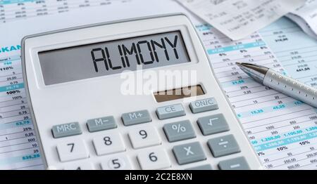 Una calcolatrice con la parola Alimony sul display Foto Stock