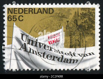 OLANDA - CIRCA 1982: Francobollo stampato dai Paesi Bassi, mostra Università di Amsterdam 350 ° anniversario, circa 1982 Foto Stock