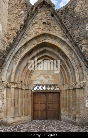 Porta del monastero cistercense, si trova nel sud della Transilvania, vicino a Sibiu, Romania. Foto Stock