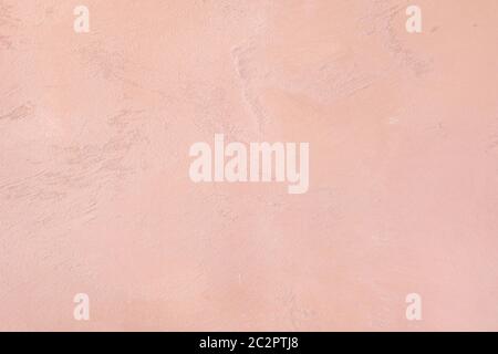 Fondo testurizzato in cemento di colore rosa pallido a basso contrasto con rugosità e irregolarità. 2020, 2021 trend colore. Foto Stock