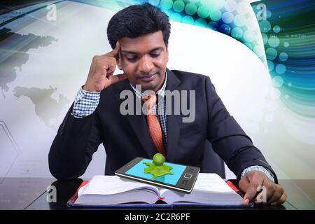 Uomo d affari con libro Foto Stock