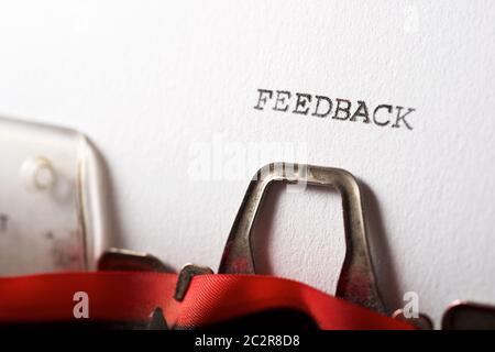 Il feedback della parola scritto con una macchina da scrivere. Foto Stock