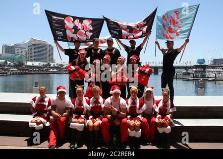 Santa Fest ‘foto di gruppo in flash MOB’ al Darling Harbour, Sydney. Foto Stock