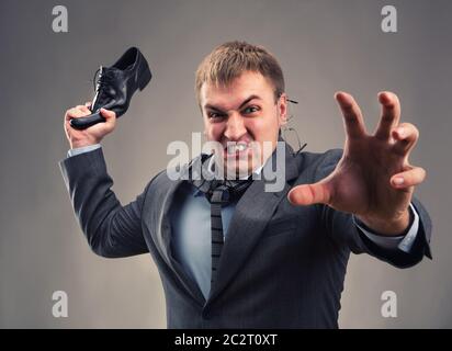 Aggressiva di lavoratore di ufficio mettere una lotta Foto Stock