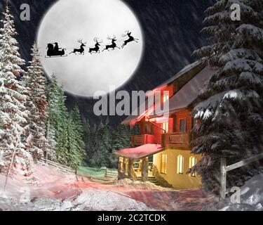 La notte di Natale. Babbo Natale e le sue renne in sella contro la luna Foto Stock