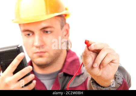 Elettricista a lavoro. Isolare su bianco Foto Stock