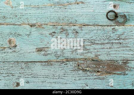 Una vecchia serranda blu in legno intemperie. Struttura in legno blu Foto Stock