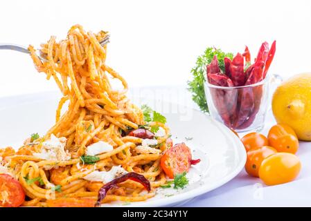 Spaghetti al granchio di salsa di pomodoro - stile tailandese Foto Stock