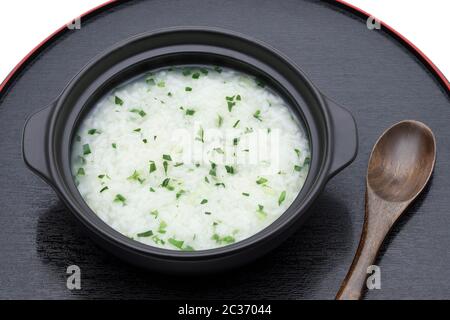 Cibo giapponese, Nanakusagayu in una ciotola da ciambella su legno trayã€€ã€€ã€€ã€€€€ ã€€€€ ã€€€€ ã€ ã€€ ã Foto Stock