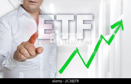 ETF concetto touchscreen è azionato dall'uomo. Foto Stock