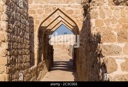 Fort in Qal'at al Bahrain. Il capitale iniziale e la porta dell'isola di Bahrain. Patrimonio Mondiale UNESCO Foto Stock