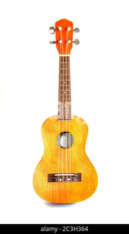 Il brown ukulele chitarra isolato su sfondo bianco Foto Stock