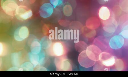 Multi colore sfocato bokeh luci sfondo - sfondo orizzontale, poster. Elegante, festosa ed elegante. Colori alla moda. Illuminato, luci, effetti glitter. Decorazione celebrativa. Foto Stock