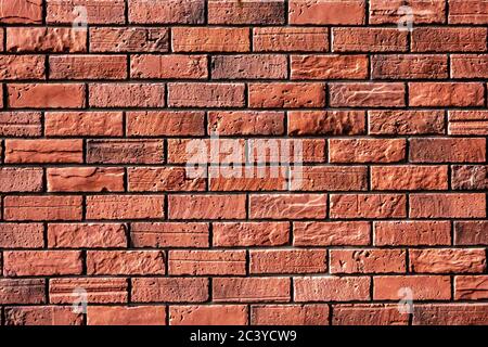 Sfondo a parete in mattoni senza cuciture. Architettura materiale natura tessitura sfondo astratto costruzione di vecchio periodo. Foto Stock
