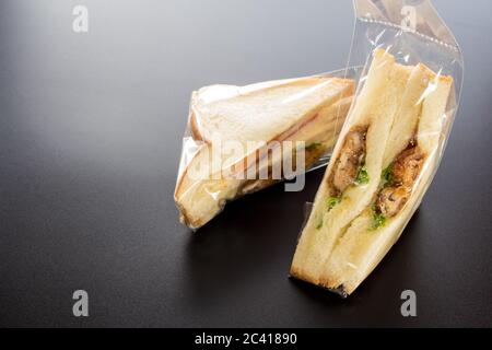 Sandwich a basso costo in confezione di plastica Foto Stock