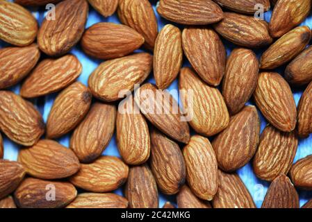 Mandorle texture sfondo / mandorle arrosto noce, vista dall'alto Foto Stock