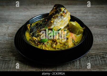 Malesia Fiume Pangasius Sutchi, Malesia Tradisional Food 'Ikan Patin Tempoyak'. Foto Stock