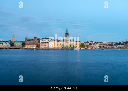 Svezia, Sodermanland, Stoccolma, Riddarholmen e Malaren lago al tramonto Foto Stock